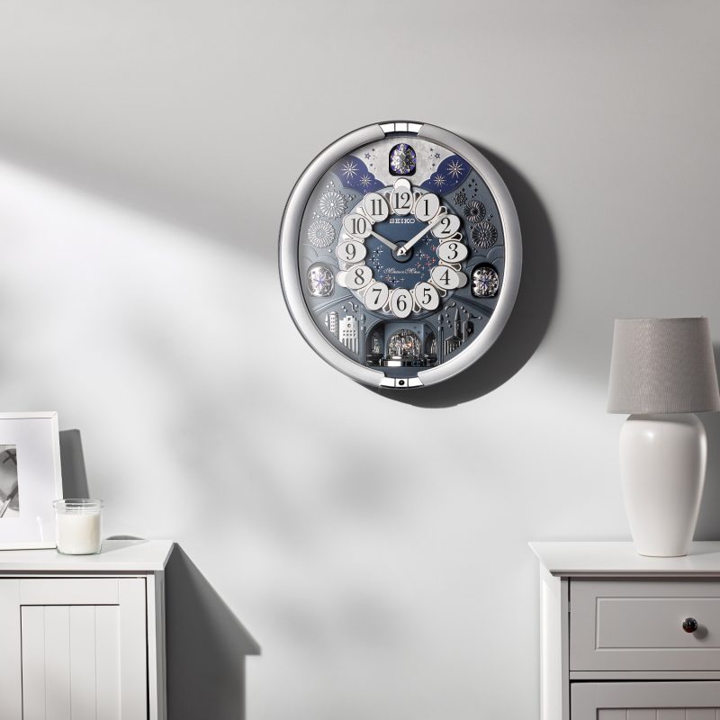 Seiko QXM379SRH “Glittering Starry Night” Melodies in Motion Dancing Dial Musical Wall Clock with 19 Songs