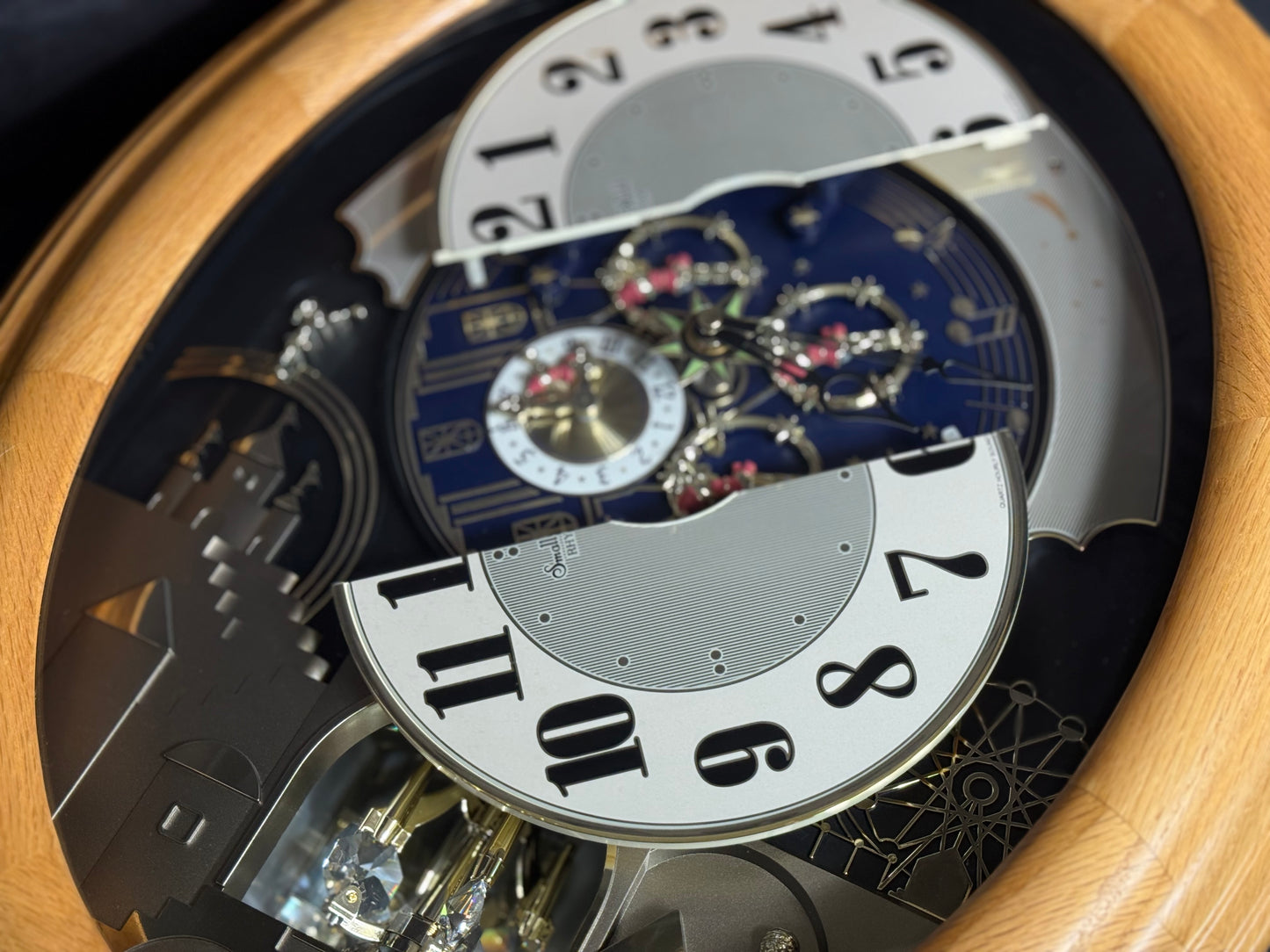 Rhythm "DWS Timecracker Oak" Moving Dial Magic Motion Musical Wooden Wall Clock with Popular Melodies - 4MH777-R07