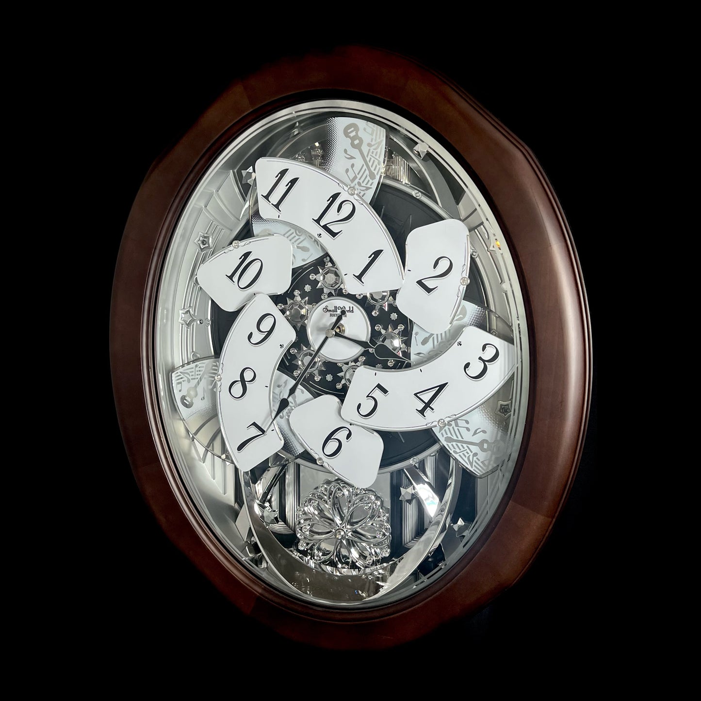 Rhythm "Anthology Espresso" Magic Motion Musical Wooden Wall Clock with Moving Dial - 4MH869WU06