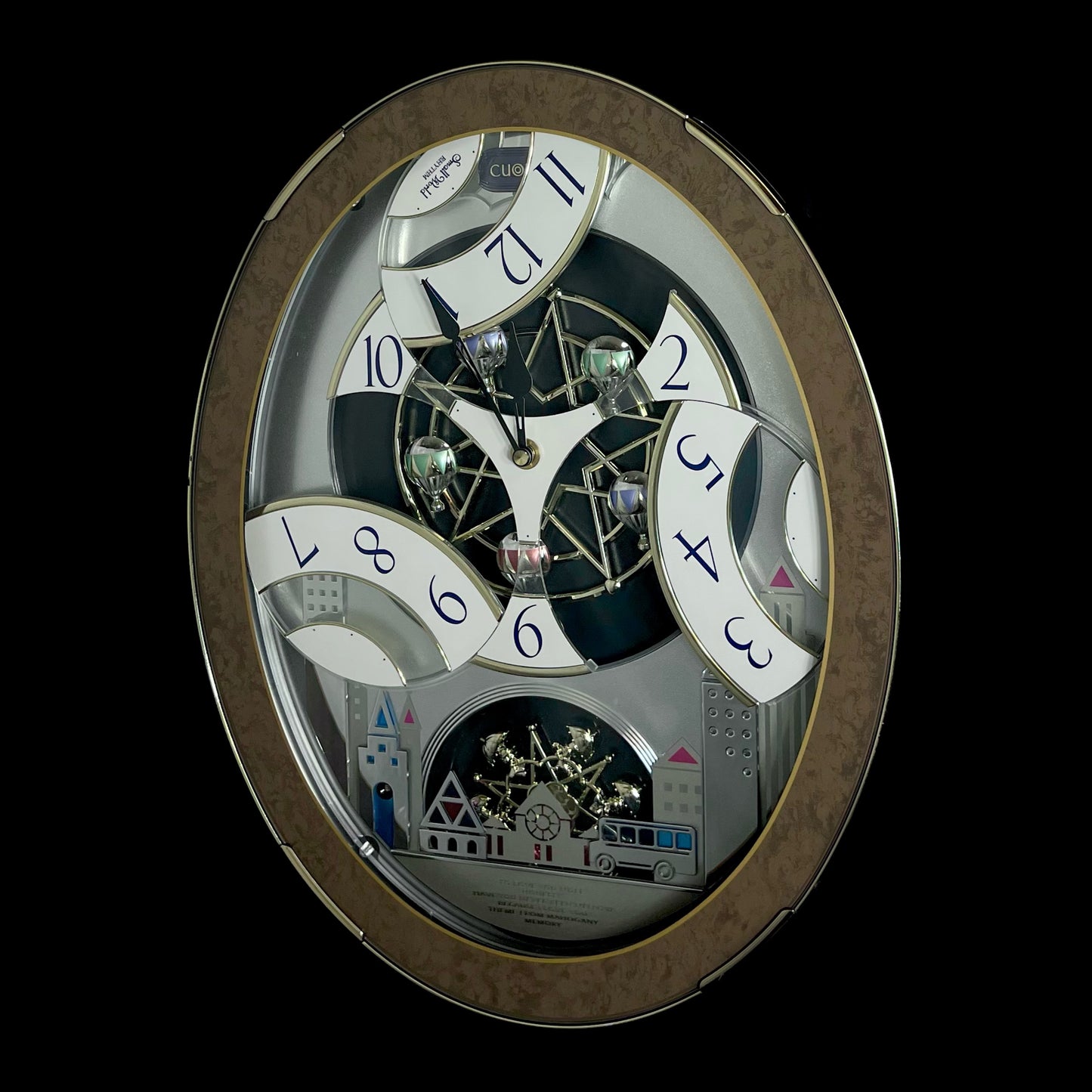 Rhythm “Tri-Cracker” Magic Motion Musical Wall Clock with Moving Dial and Balloons - 4MH759NR06