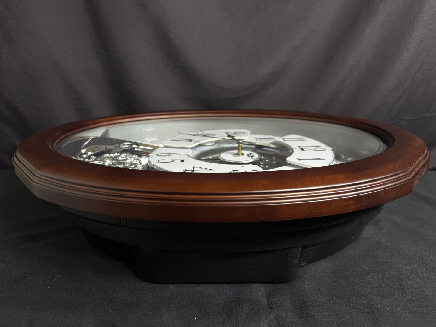 Rhythm "Anthology Espresso" Magic Motion Musical Wooden Wall Clock with Moving Dial - 4MH869WU06
