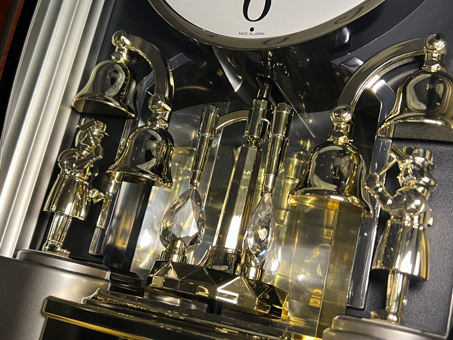 Rhythm "Golden Ringers" Magic Motion Musical Wall Clock with Animated Figurines - 4MH740NR23