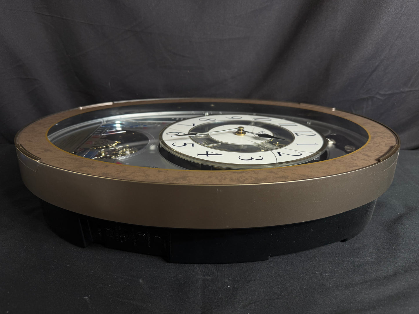 Rhythm “Tri-Cracker” Magic Motion Musical Wall Clock with Moving Dial and Balloons - 4MH759NR06