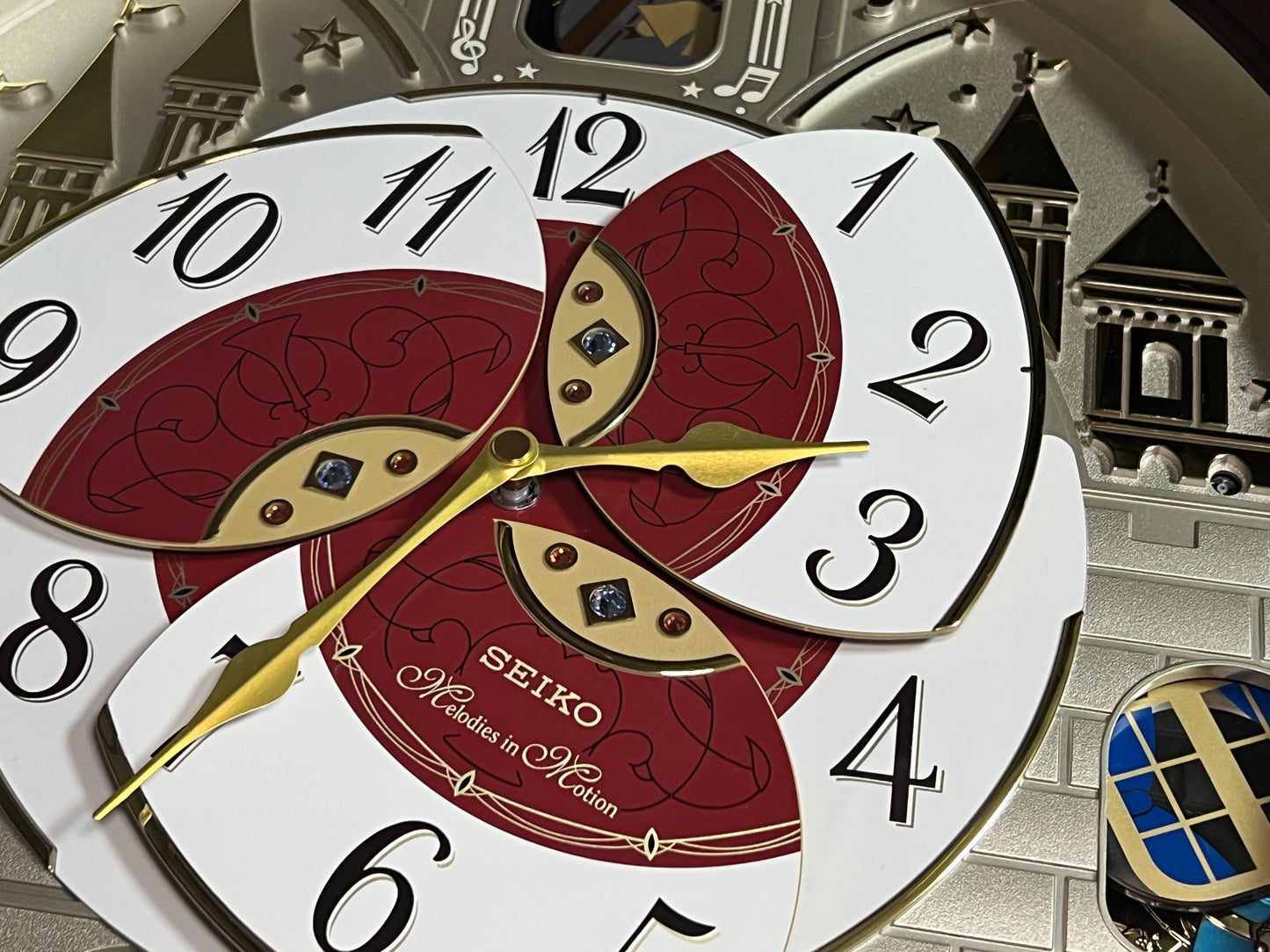 Seiko QXM565BRH "2016 Special Collector's Edition" Melodies in Motion Dancing Dial Musical Wall Clock with Music by The Beatles
