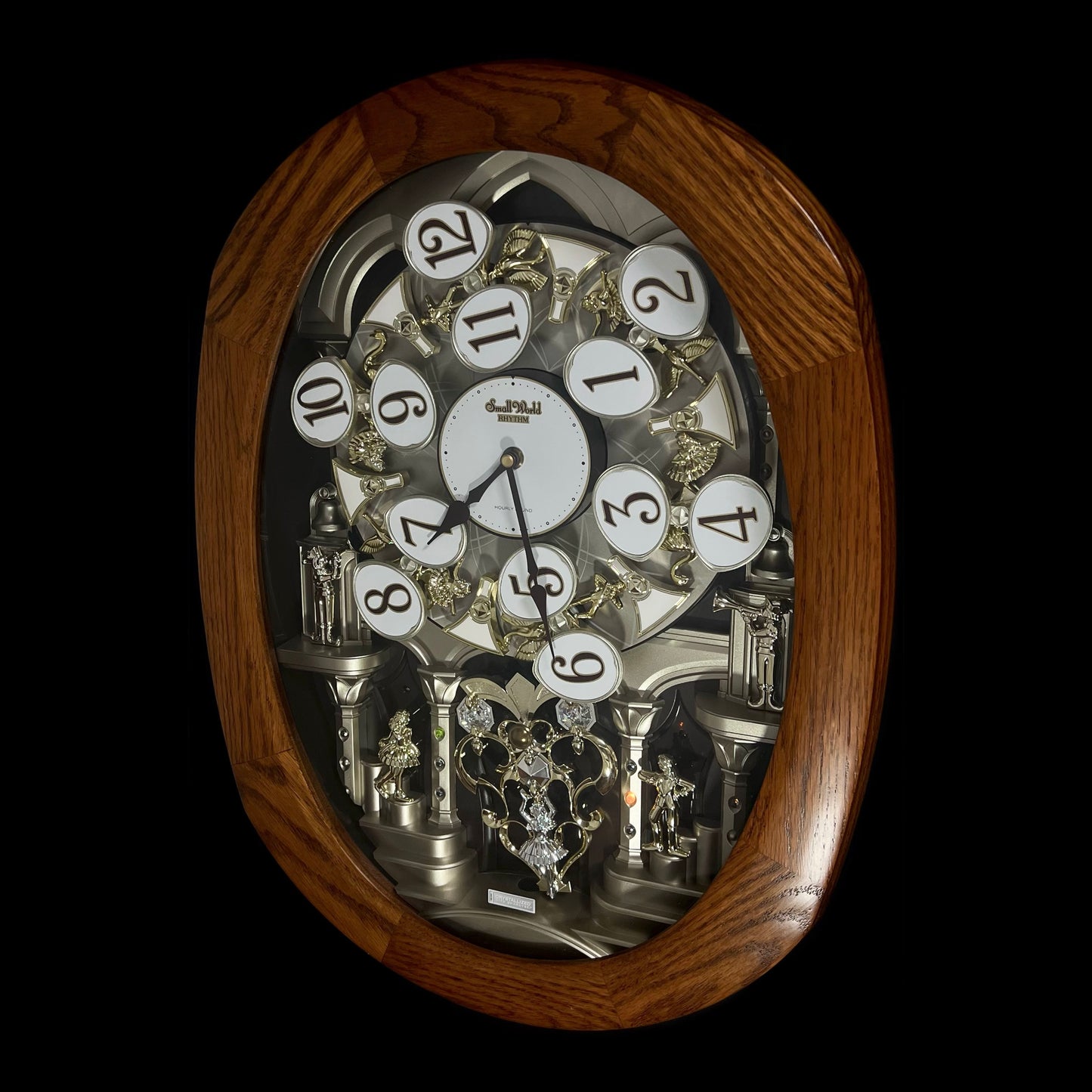Rhythm "SSS Encore" Magic Motion Musical Wooden Wall Clock with Animated Moving Dial and Popular Melodies - 4MH810-R06