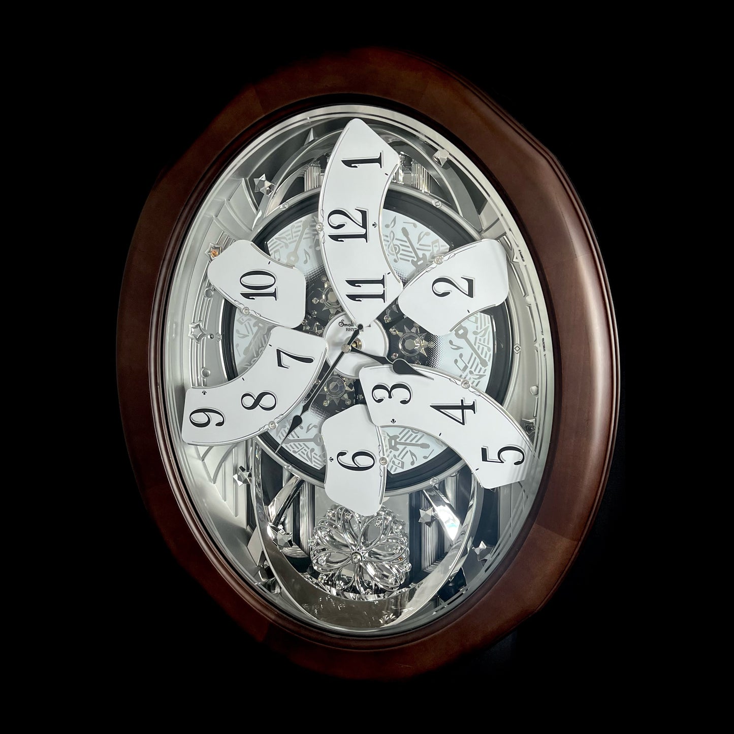 Rhythm "Anthology Espresso" Magic Motion Musical Wooden Wall Clock with Moving Dial - 4MH869WU06