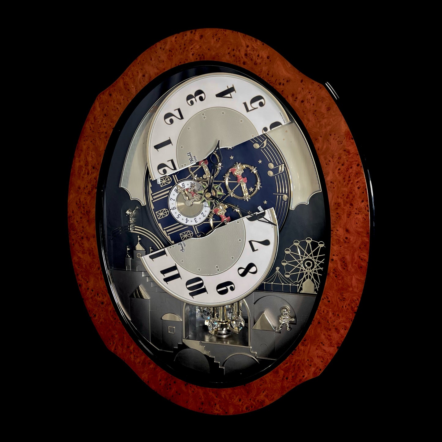 Rhythm “DWS Timecracker” Moving Dial Magic Motion Musical Wooden Wall Clock with Popular Melodies - 4MH752-R06