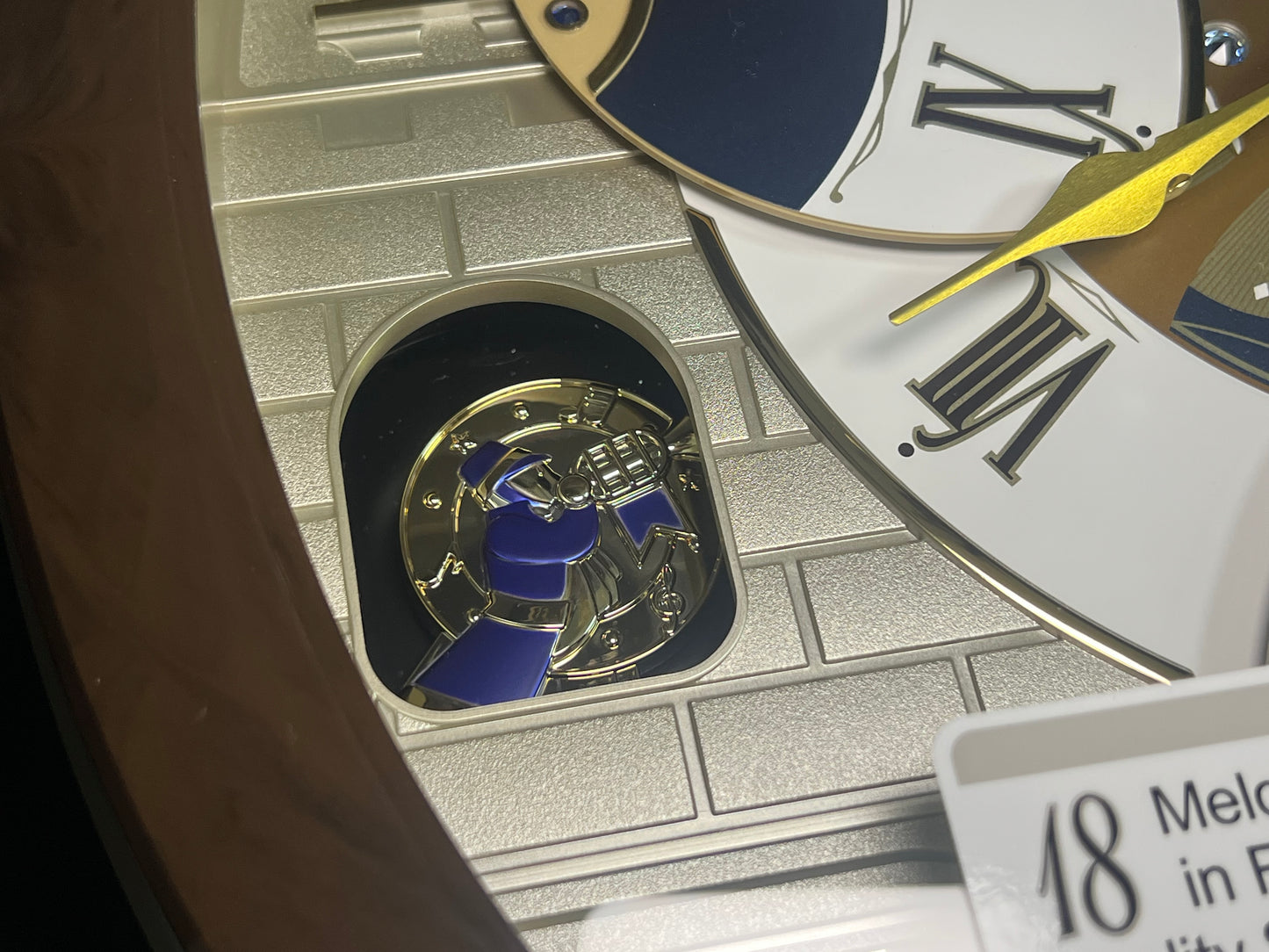 Seiko QXM371BRH “Castle Windows” Melodies in Motion Dancing Dial Musical Wall Clock