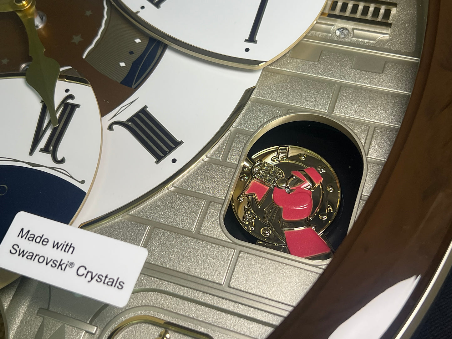 Seiko QXM371BRH “Castle Windows” Melodies in Motion Dancing Dial Musical Wall Clock