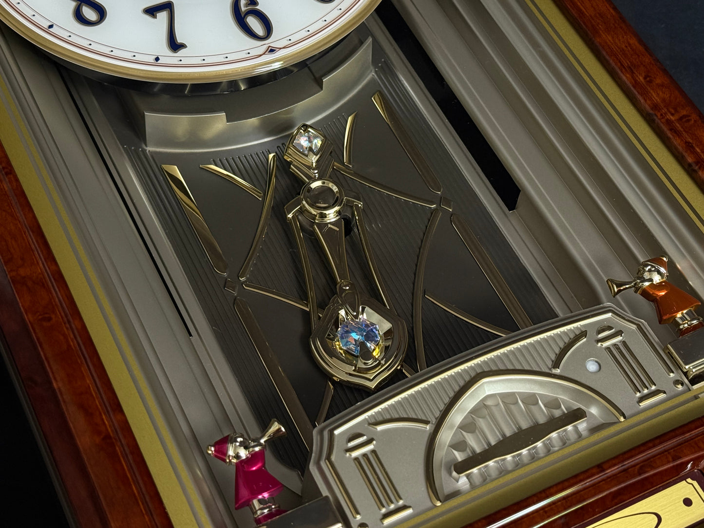 Seiko QXM223BRH "Classic Dropping Dial" Melodies in Motion Musical Moving Wall Clock