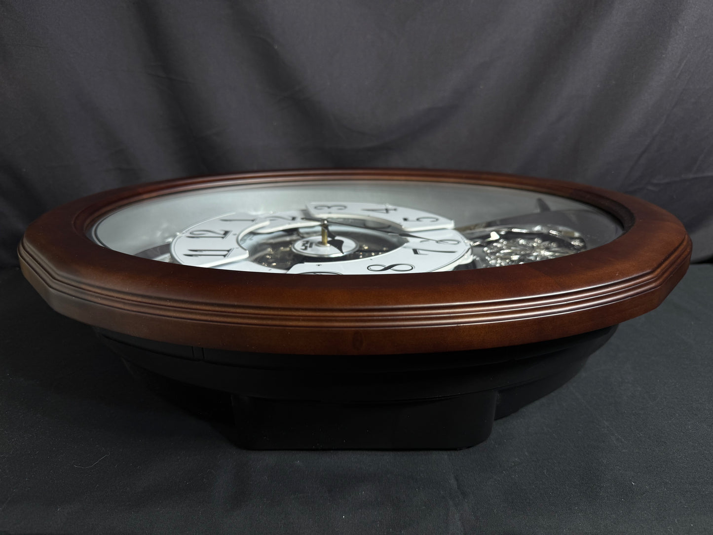 Rhythm "Anthology Espresso" Magic Motion Musical Wooden Wall Clock with Moving Dial - 4MH869WU06