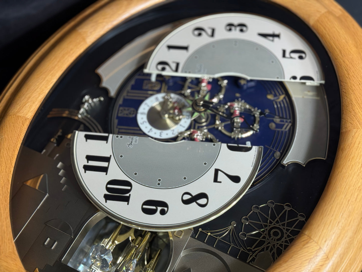 Rhythm "DWS Timecracker Oak" Moving Dial Magic Motion Musical Wooden Wall Clock with Popular Melodies - 4MH777-R07
