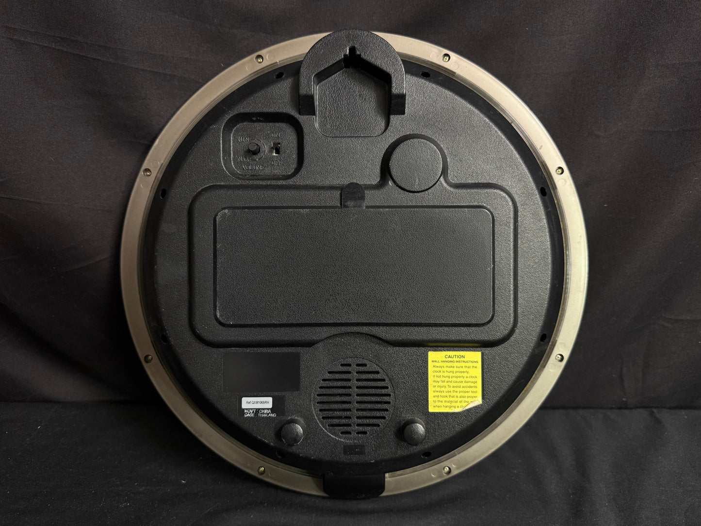 Seiko QXM106SRH "Twirling Numbers" Melodies in Motion Musical Wall Clock with Moving Dial