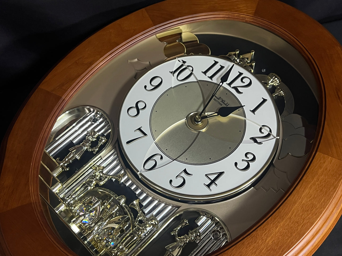 Rhythm "Nostalgia Legend" Moving Dial Magic Motion Musical Wooden Wall Clock with Music by The Beatles - 4MH832WB06