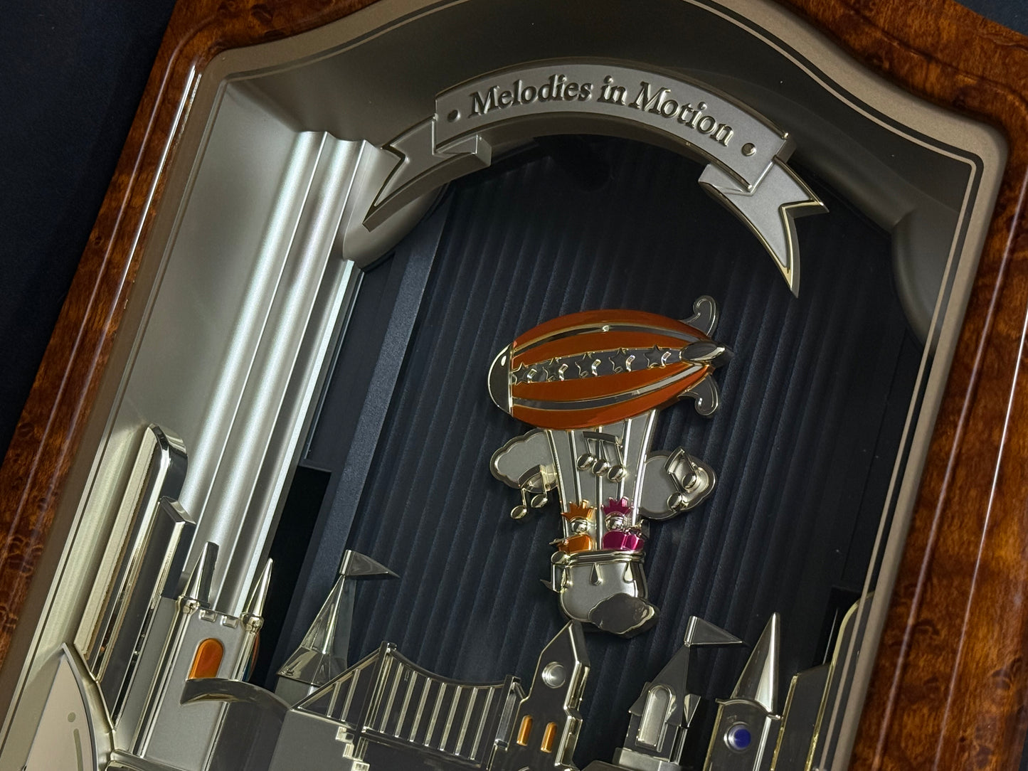 Seiko QXM135BRH "Lover’s Castle" Melodies in Motion Musical Moving Wall Clock with Popular Melodies