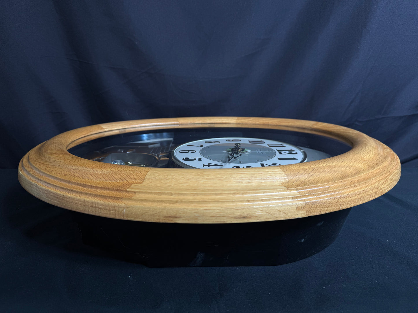 Rhythm "DWS Timecracker Oak" Moving Dial Magic Motion Musical Wooden Wall Clock with Popular Melodies - 4MH777-R07