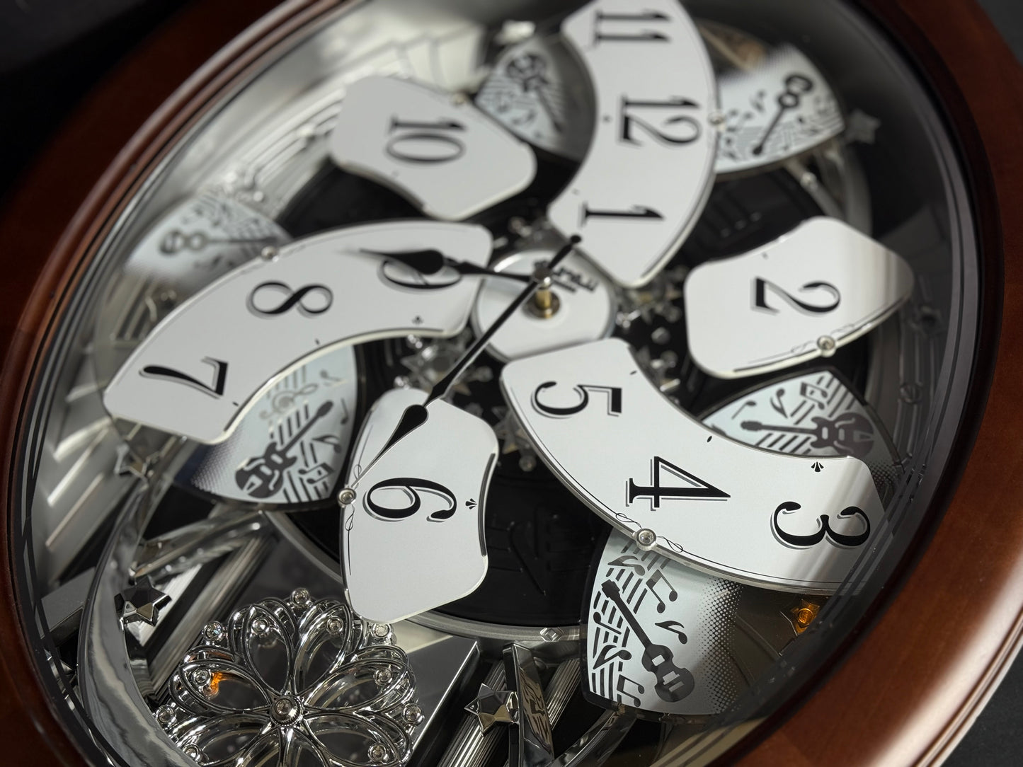 Rhythm "Anthology Espresso" Magic Motion Musical Wooden Wall Clock with Moving Dial - 4MH869WU06