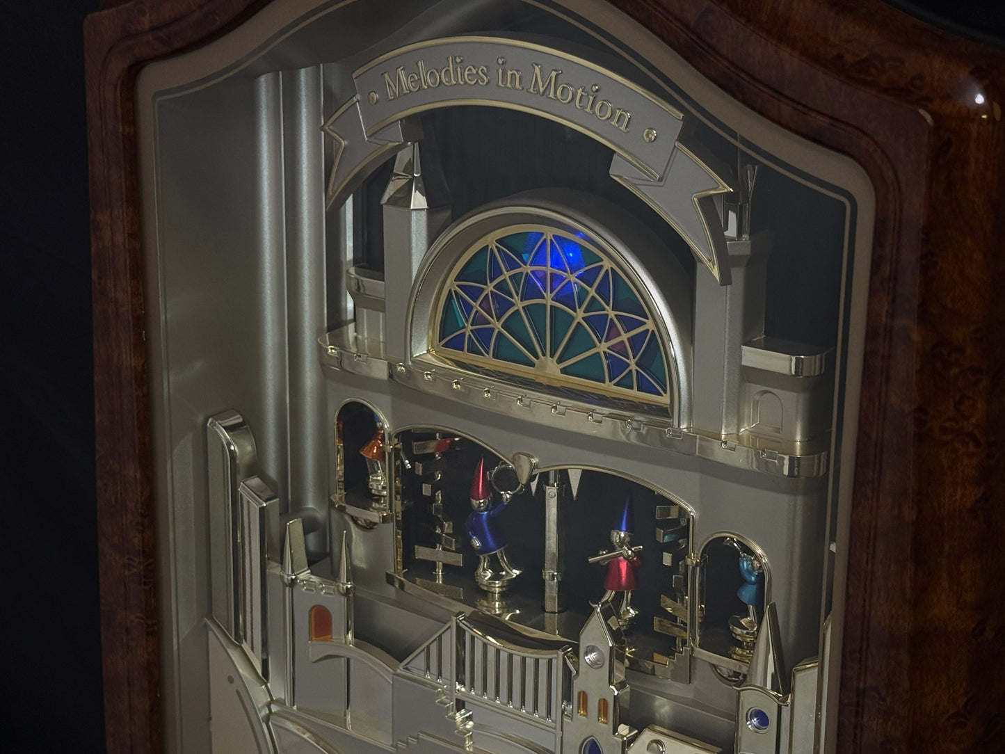 Seiko QXM135BRH "Lover’s Castle" Melodies in Motion Musical Moving Wall Clock with Popular Melodies