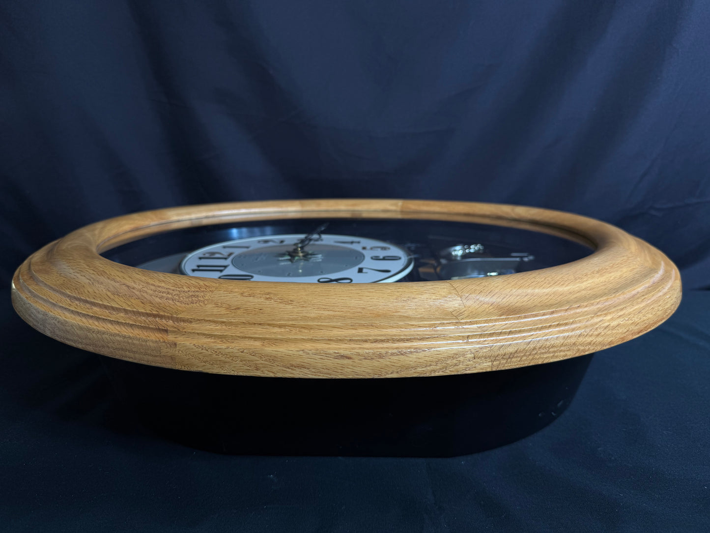 Rhythm "DWS Timecracker Oak" Moving Dial Magic Motion Musical Wooden Wall Clock with Popular Melodies - 4MH777-R07