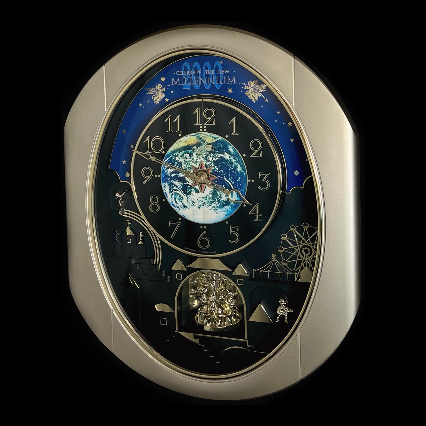 Rhythm “Timecracker 2000” Limited Edition Moving Earth Dial Magic Motion Musical Wall Clock with Popular Melodies - 4MH751NR19