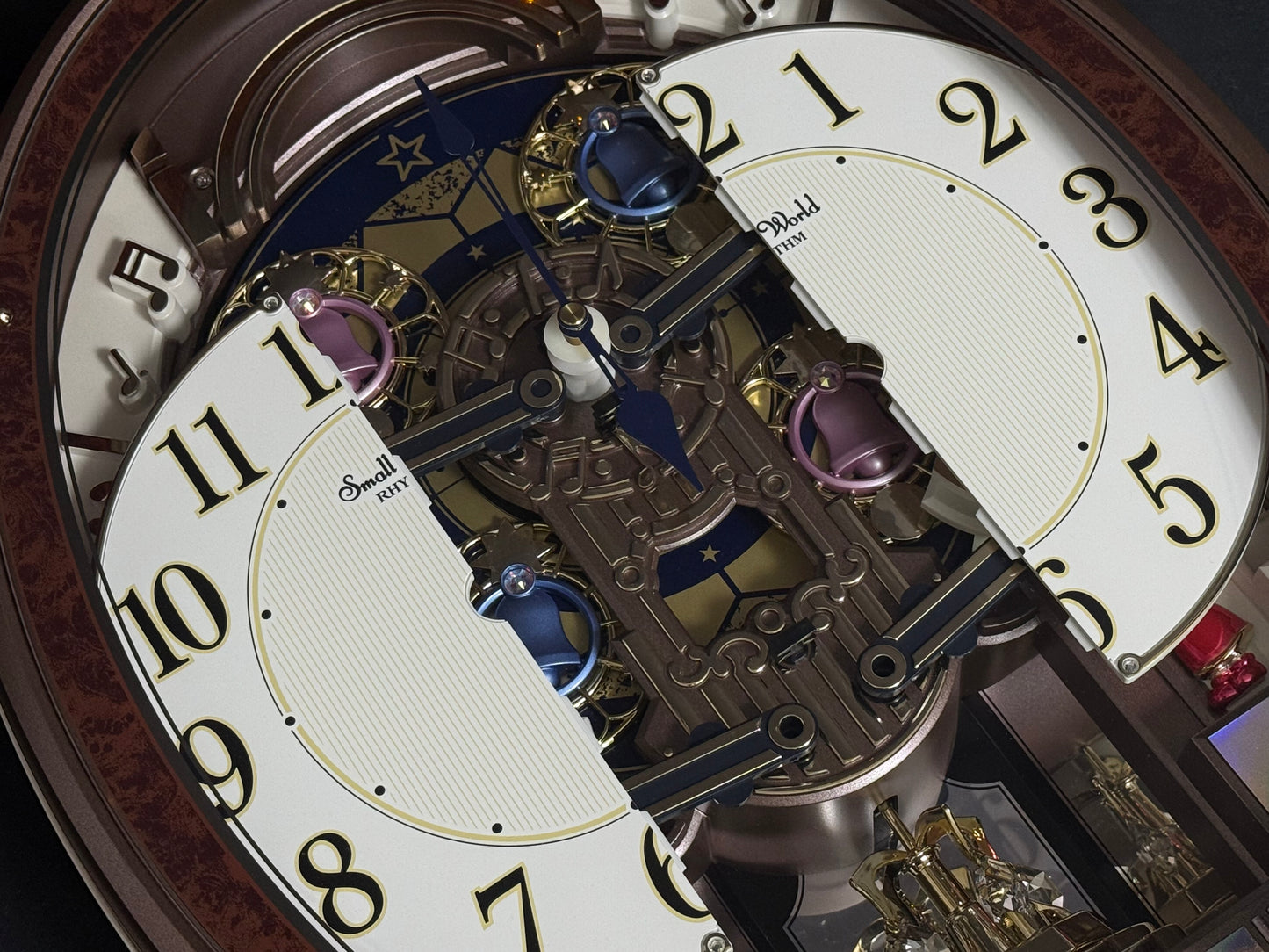 Rhythm "Harmony Blessing" Moving Dial Magic Motion Musical Wall Clock - 4MH423WR23