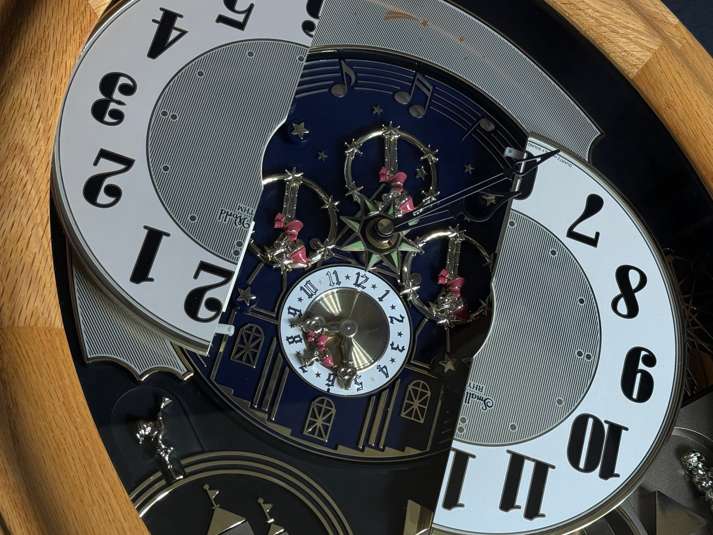 Rhythm "DWS Timecracker Oak" Moving Dial Magic Motion Musical Wooden Wall Clock with Popular Melodies - 4MH777-R07