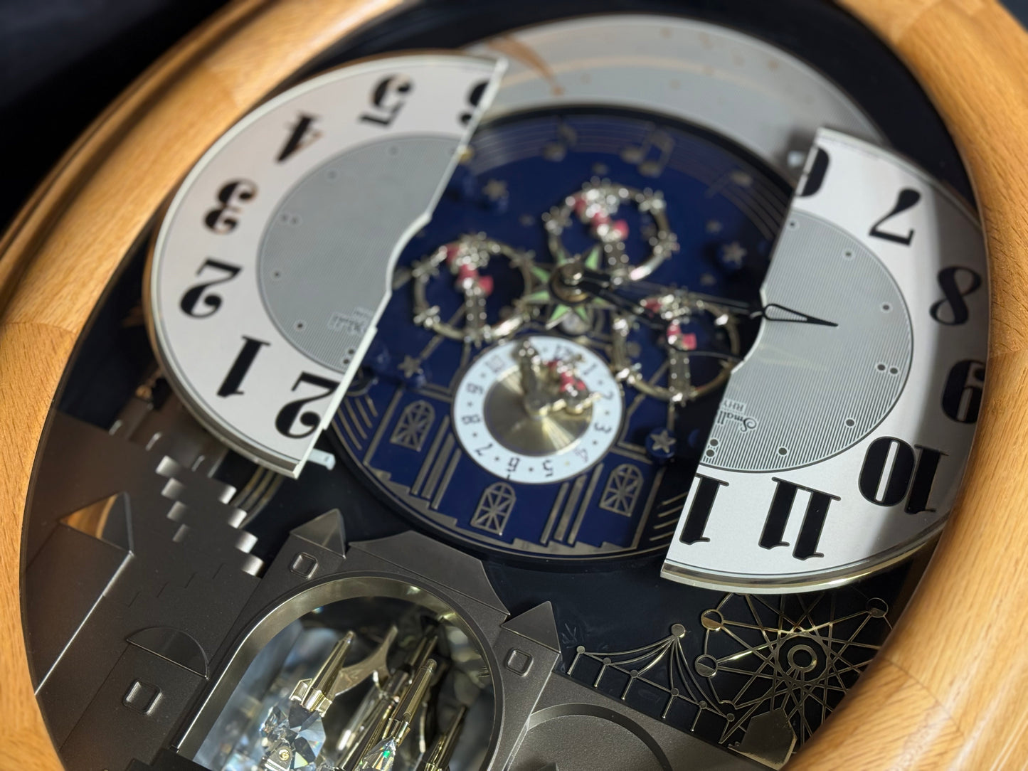 Rhythm "DWS Timecracker Oak" Moving Dial Magic Motion Musical Wooden Wall Clock with Popular Melodies - 4MH777-R07