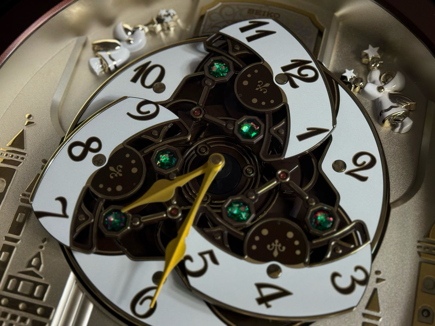 Seiko QXM291BRH "Spring Dance" Melodies in Motion Dancing Dial Musical Wall Clock with 18 Songs