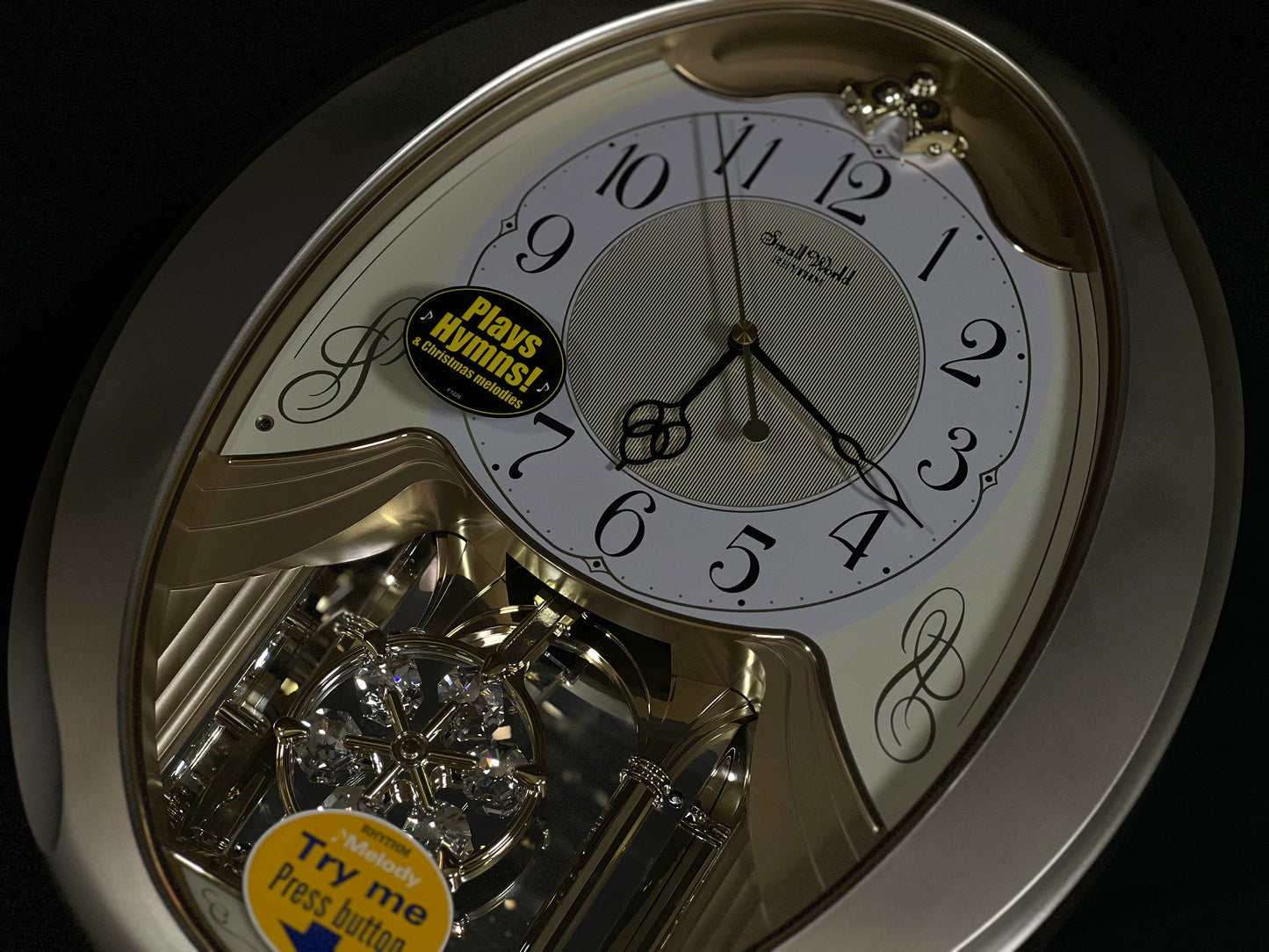 Rhythm “Champagne Snowflake” Musical Motion Decorative Pendulum Wall Clock - 4MJ447WU18