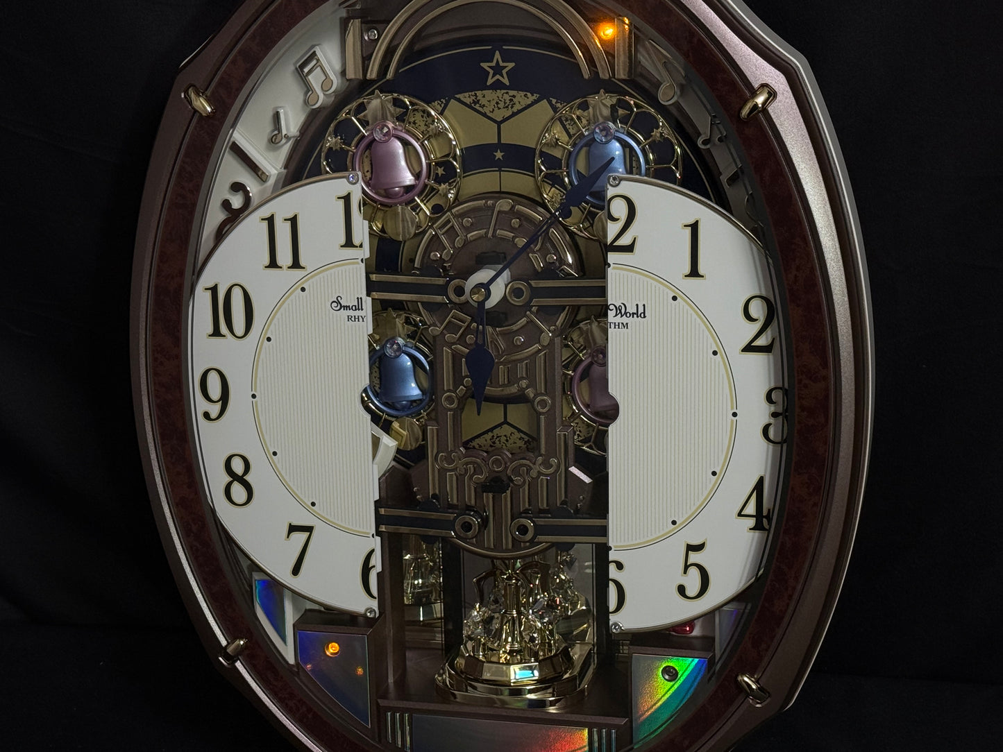 Rhythm "Harmony Blessing" Moving Dial Magic Motion Musical Wall Clock - 4MH423WR23