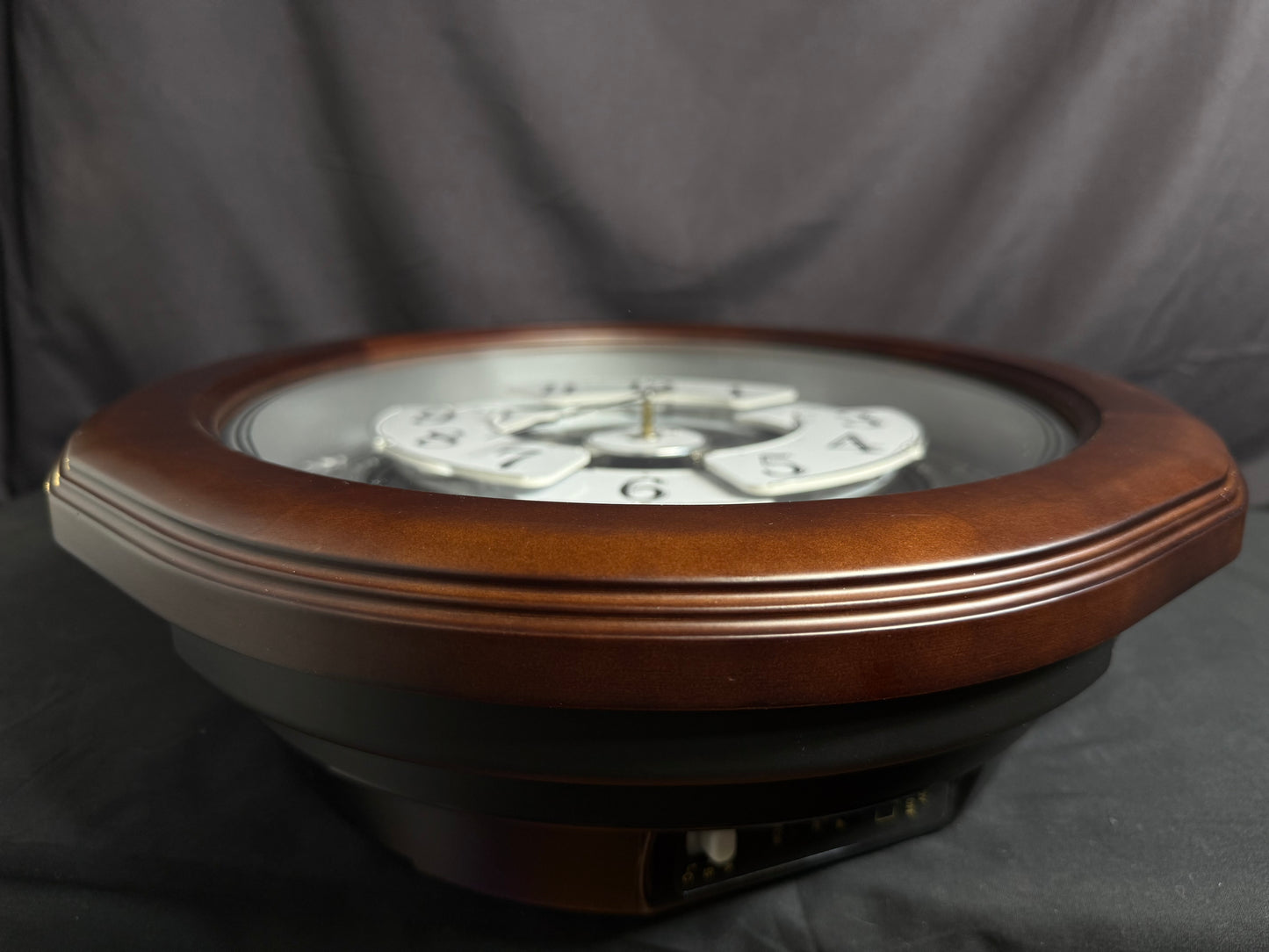 Rhythm "Anthology Espresso" Magic Motion Musical Wooden Wall Clock with Moving Dial - 4MH869WU06