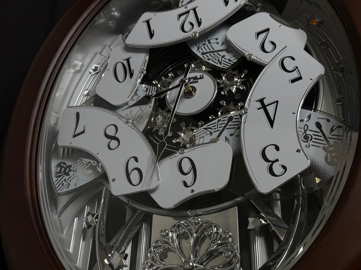 Rhythm "Anthology Espresso" Magic Motion Musical Wooden Wall Clock with Moving Dial - 4MH869WU06