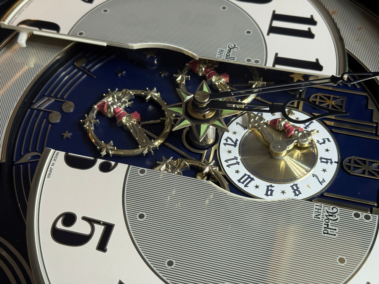 Rhythm "DWS Timecracker Oak" Moving Dial Magic Motion Musical Wooden Wall Clock with Popular Melodies - 4MH777-R07