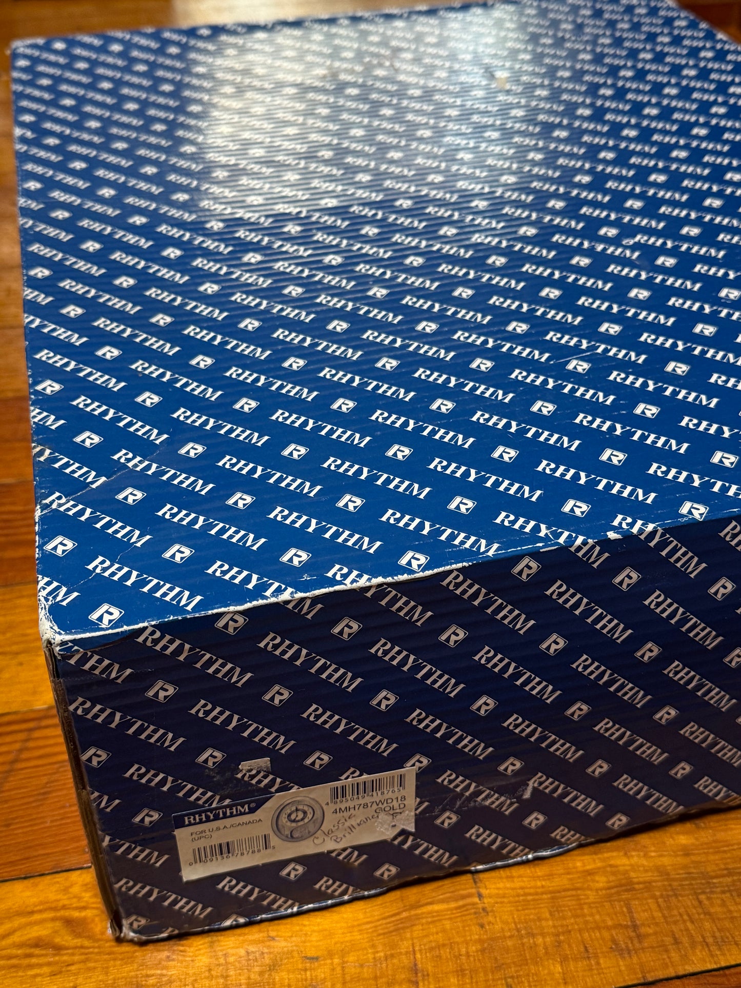 Rhythm "Classic Brilliance" Moving Dial Magic Motion Musical Wall Clock - 4MH787PD18