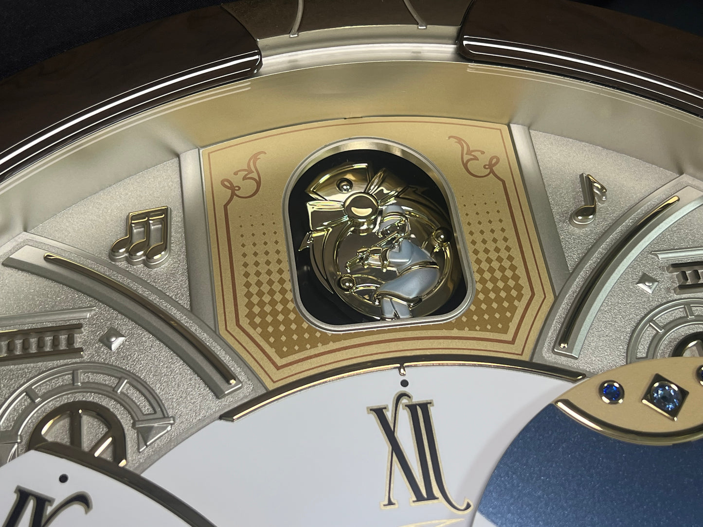 Seiko QXM371BRH “Castle Windows” Melodies in Motion Dancing Dial Musical Wall Clock