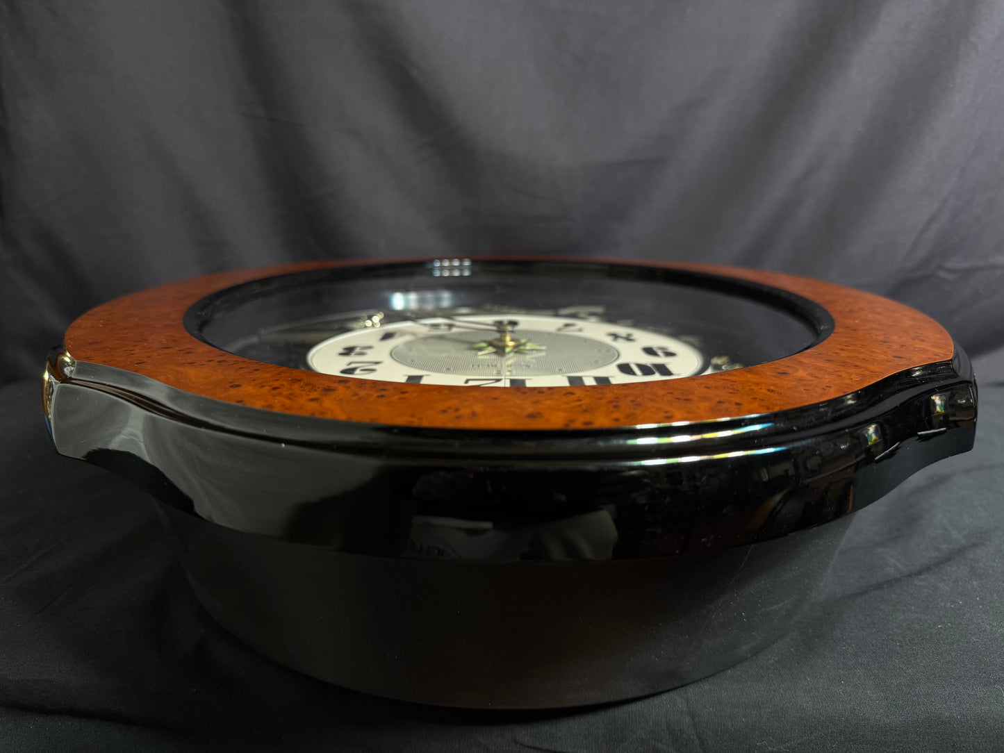 Rhythm “DWS Timecracker” Moving Dial Magic Motion Musical Wooden Wall Clock with Popular Melodies - 4MH752-R06