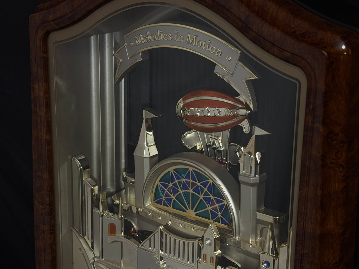 Seiko QXM135BRH "Lover’s Castle" Melodies in Motion Musical Moving Wall Clock with Popular Melodies