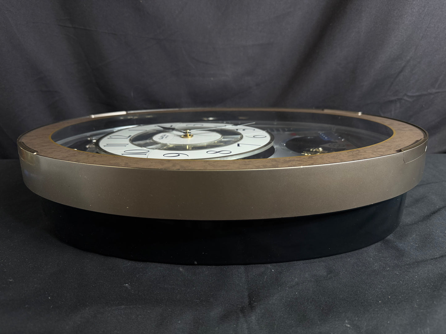 Rhythm “Tri-Cracker” Magic Motion Musical Wall Clock with Moving Dial and Balloons - 4MH759NR06