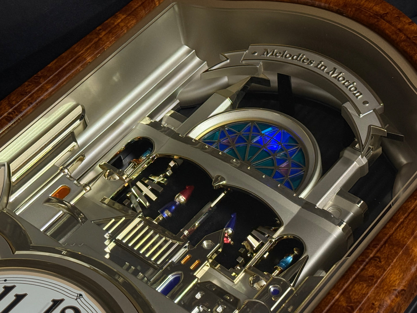 Seiko QXM135BRH "Lover’s Castle" Melodies in Motion Musical Moving Wall Clock with Popular Melodies