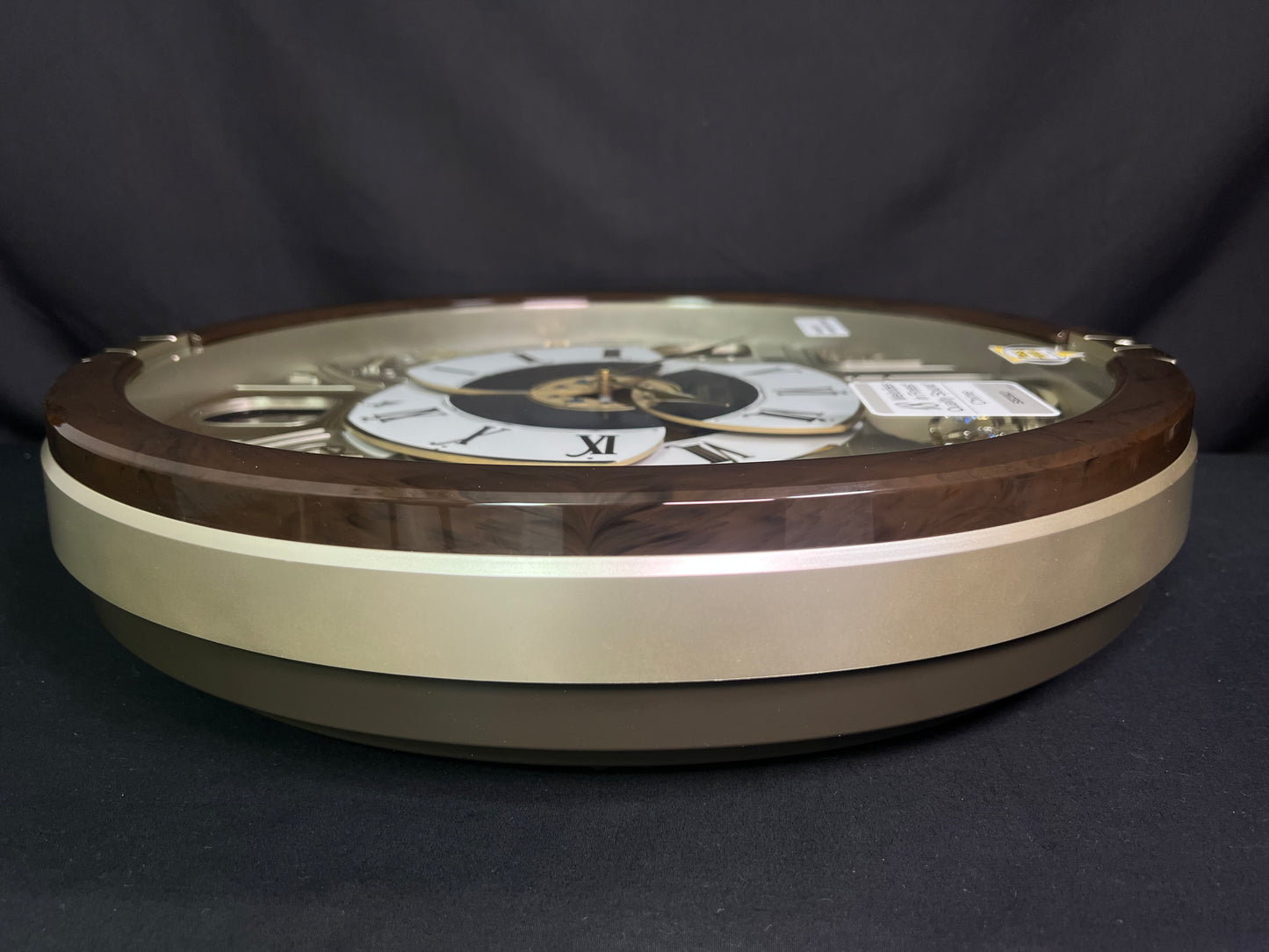 Seiko QXM371BRH “Castle Windows” Melodies in Motion Dancing Dial Musical Wall Clock