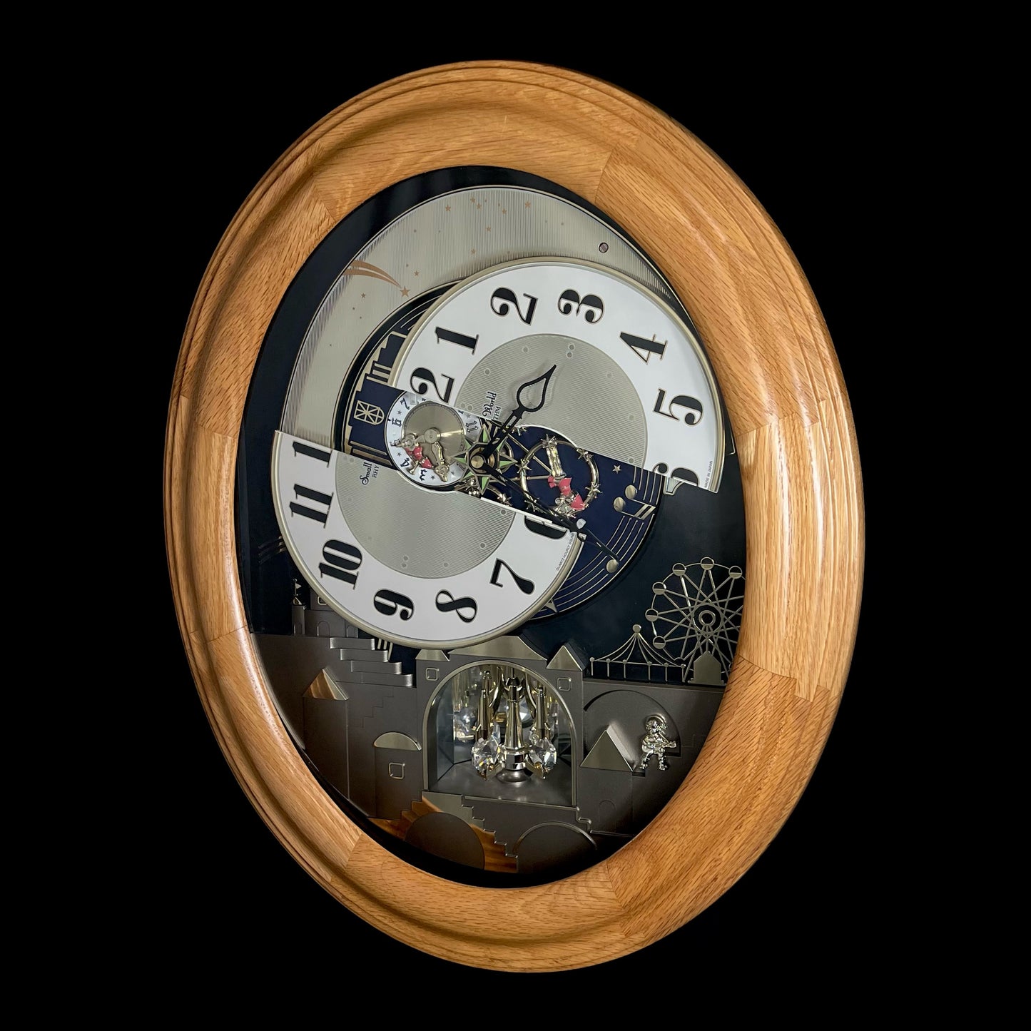Rhythm "DWS Timecracker Oak" Moving Dial Magic Motion Musical Wooden Wall Clock with Popular Melodies - 4MH777-R07