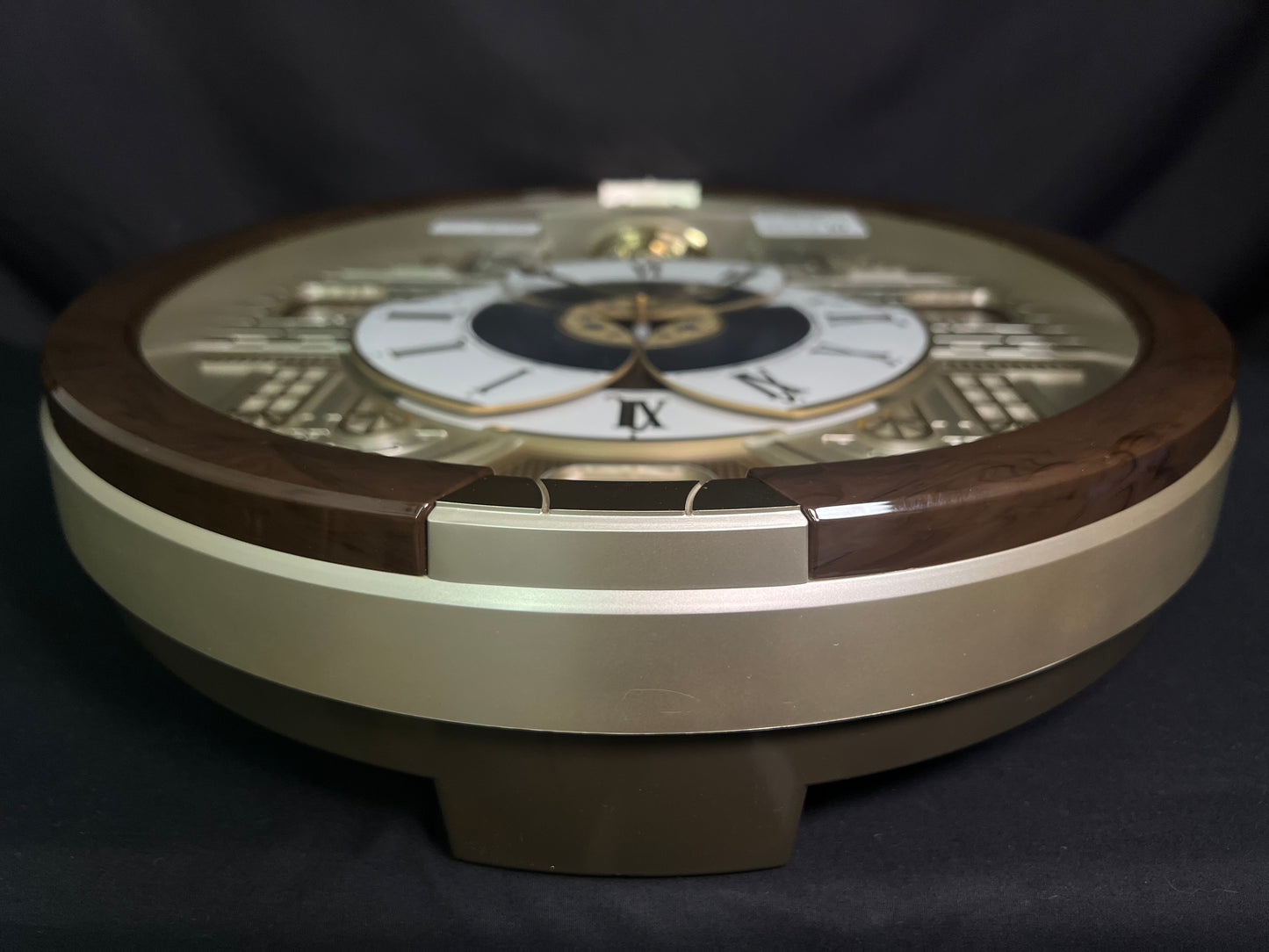 Seiko QXM371BRH “Castle Windows” Melodies in Motion Dancing Dial Musical Wall Clock