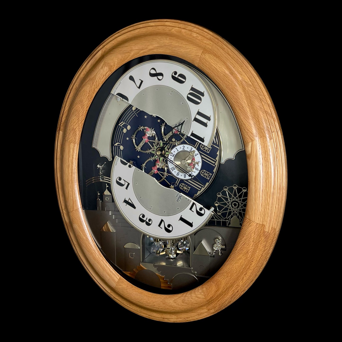 Rhythm "DWS Timecracker Oak" Moving Dial Magic Motion Musical Wooden Wall Clock with Popular Melodies - 4MH777-R07