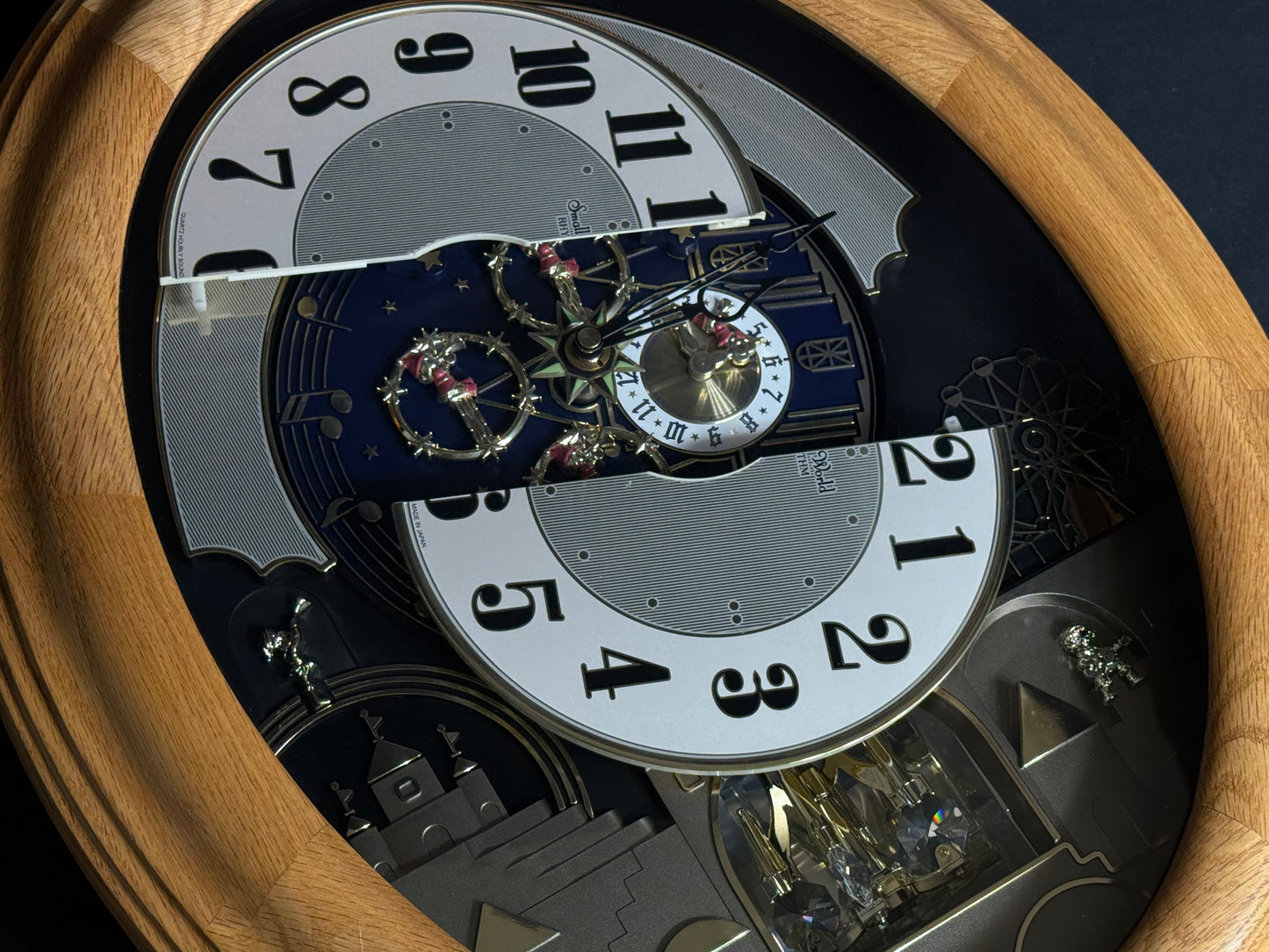 Rhythm "DWS Timecracker Oak" Moving Dial Magic Motion Musical Wooden Wall Clock with Popular Melodies - 4MH777-R07