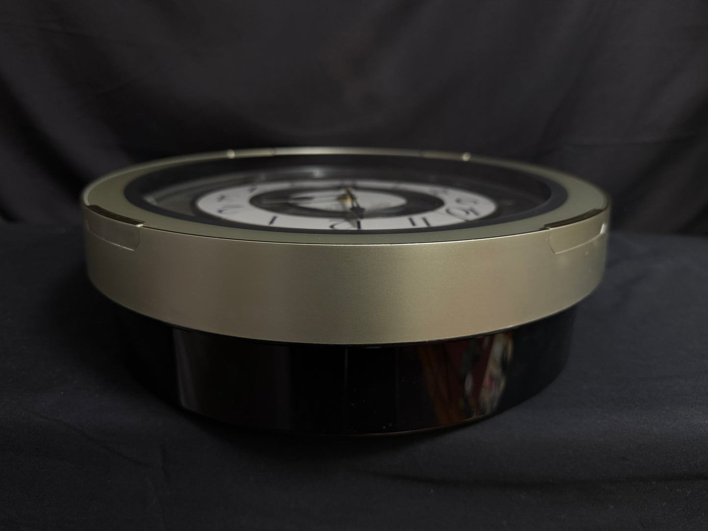 Rhythm "CTS Brilliance" Moving Dial Magic Motion Musical Wall Clock with Popular Melodies - 4MH787-R18