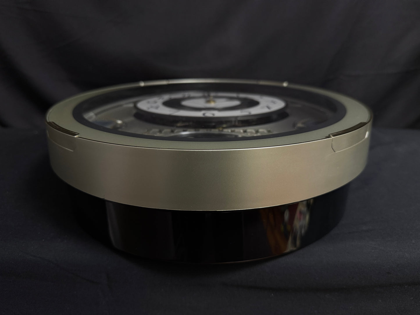 Rhythm "CTS Brilliance" Moving Dial Magic Motion Musical Wall Clock with Popular Melodies - 4MH787-R18