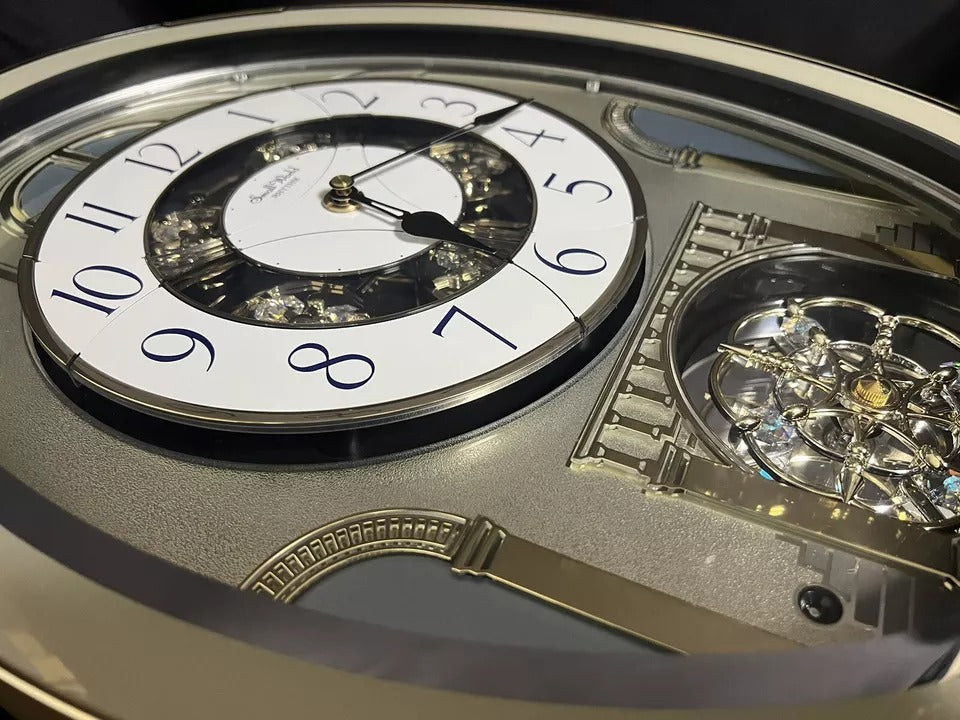 Rhythm "Classic Brilliance" Moving Dial Magic Motion Musical Wall Clock - 4MH787PD18