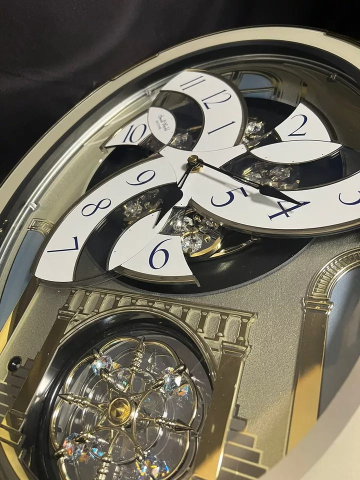 Rhythm "Classic Brilliance" Moving Dial Magic Motion Musical Wall Clock - 4MH787PD18