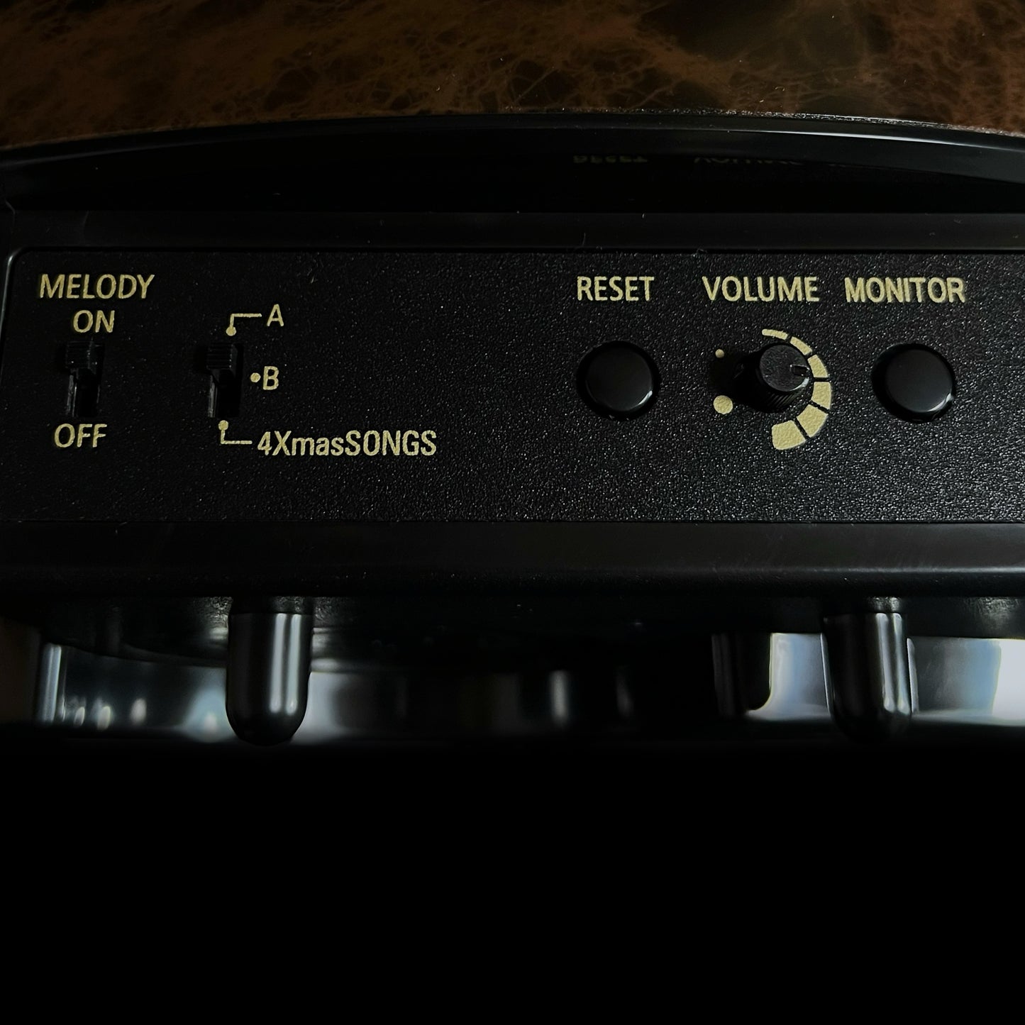 Rhythm “Woodgrain Blossom” Magic Motion Musical Wall Clock with Animated Moving Dial - 4MH828WD23