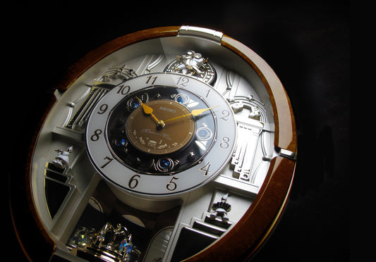 Seiko QXM289BRH "Golden Trumpets" Melodies in Motion Musical Wall Clock with Moving Figurines